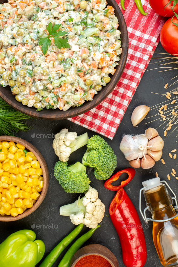 top view vegetable salad with seasonings vegetables and greens on dark